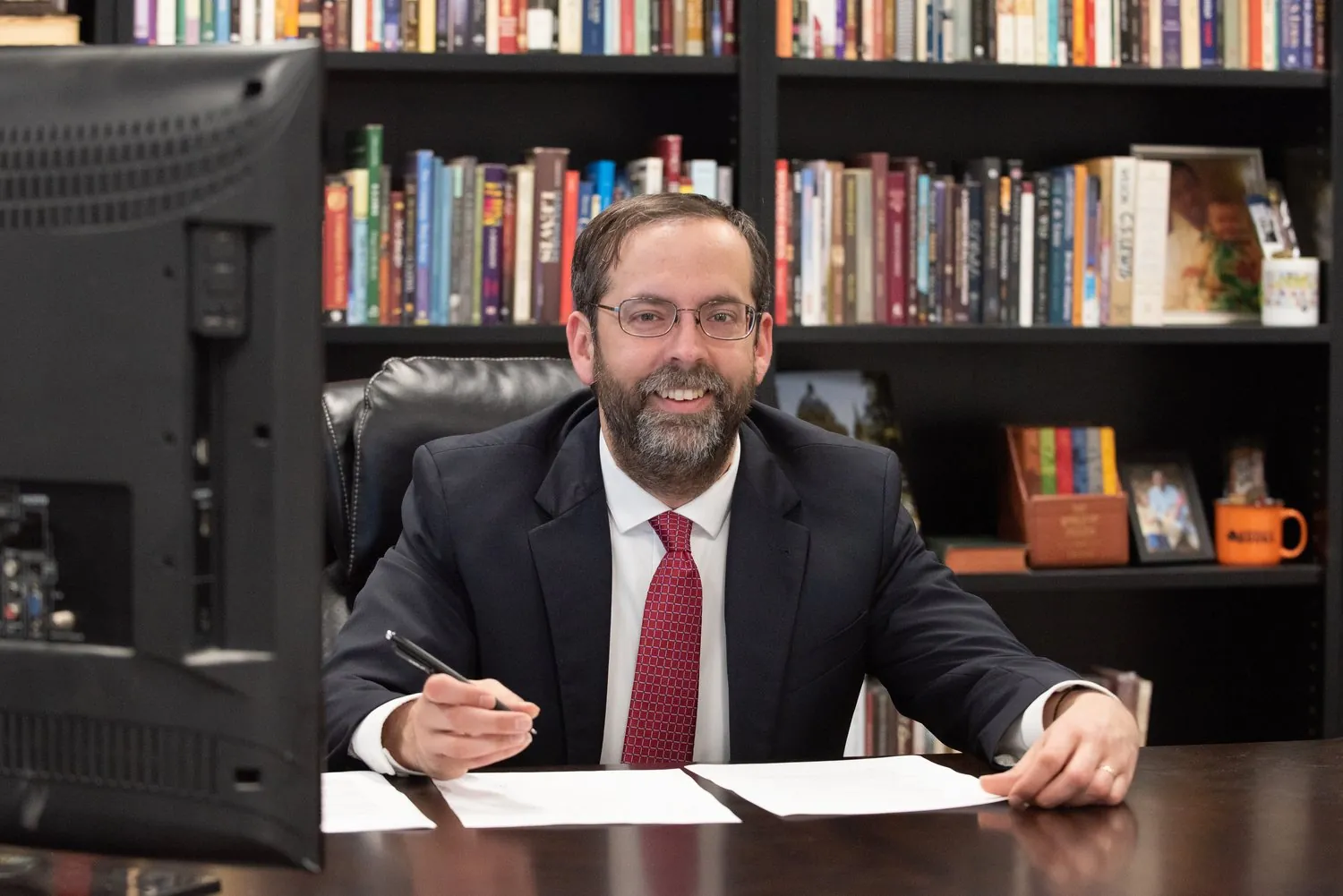 Shane Gottwals at his desk